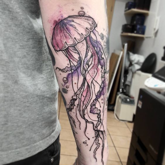 Large jellyfish tattoo on the forearm for men