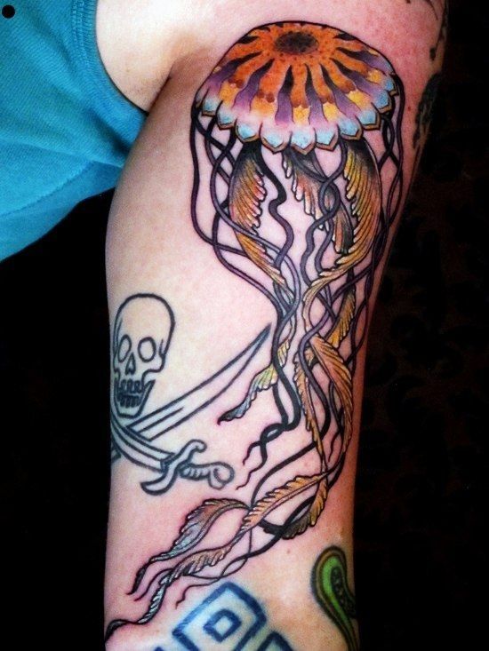 Colored jellyfish tattoo on the shoulder for men