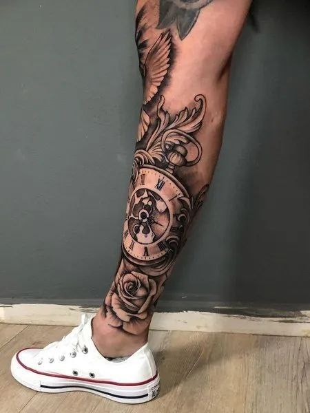 Large watch and rose tattoo on the shin for men