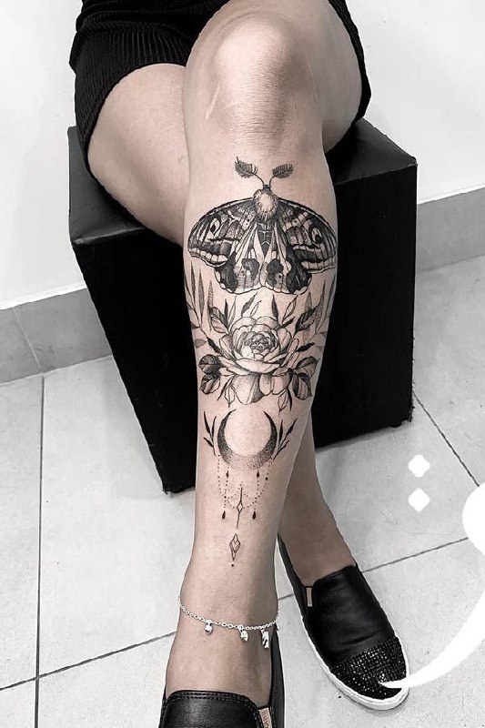 Large shin tattoo for women