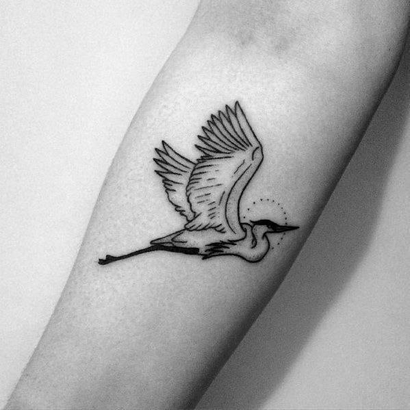 Stork tattoo on the forearm for women