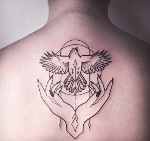 Tattoo of a dove on the back for men