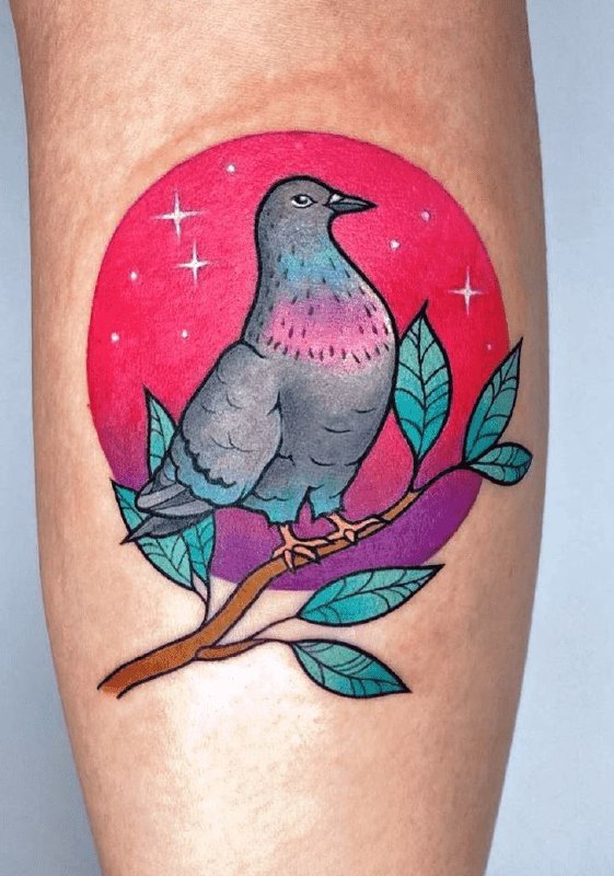 Color tattoo of a dove on a calf for women