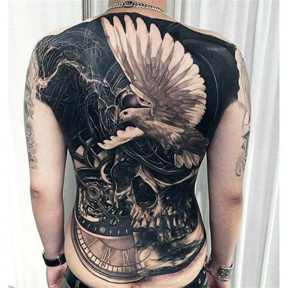 Large tattoo of a dove on the back for men