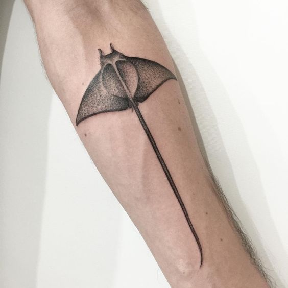 Large stingray tattoo on the forearm for men