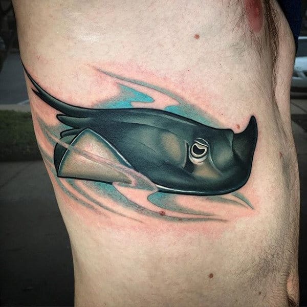 Large stingray tattoo on the side for men