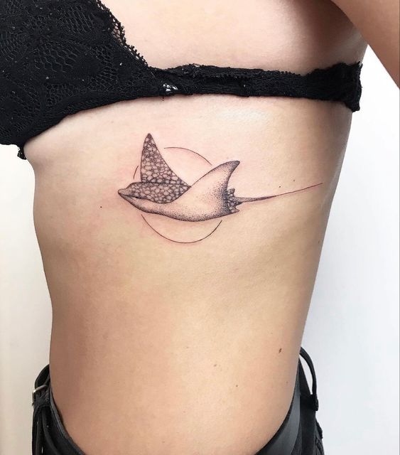 Stingray tattoo on the side for women