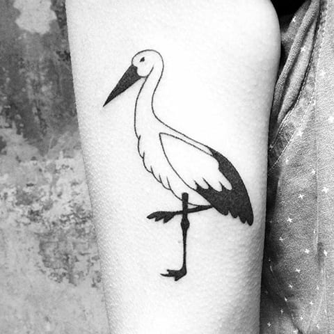 Large stork tattoo on the shoulder for women