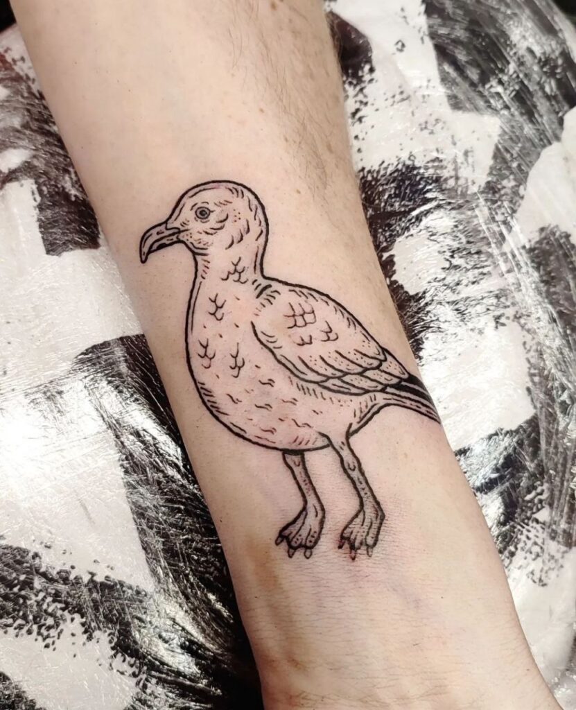 Large seagull tattoo on the arm for men Large seagull tattoo on the arm for men