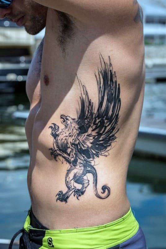 Large tattoo on the side for men