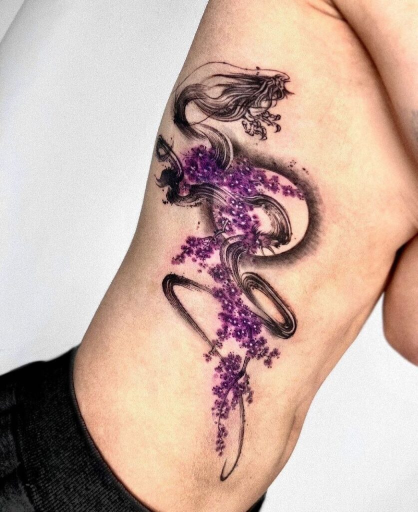 Large dragon tattoo on the side for women