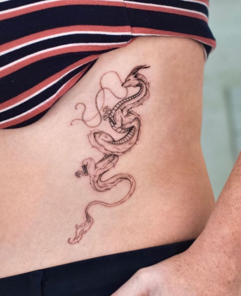 Dragon tattoo on the side for women