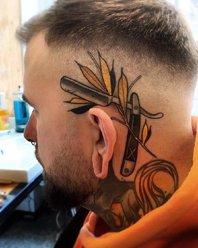 Color tattoo on the head for men