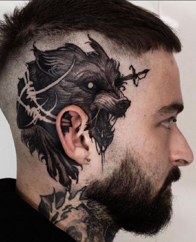 Wolf tattoo on the head for men