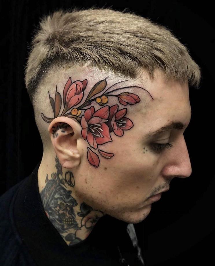 Tattoo of flowers on the head for men