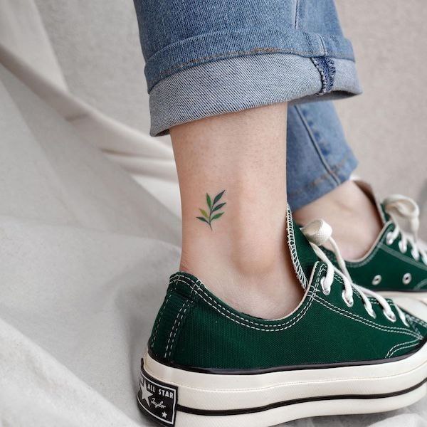 Colorful ankle leaf tattoo for women