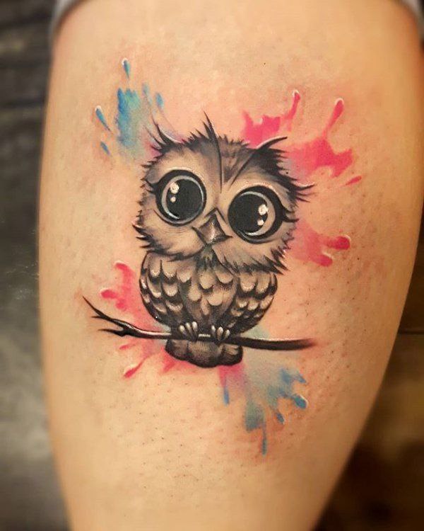 Colorful owl tattoo on the shoulder for women