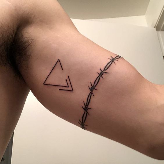 Barbed wire tattoo on biceps for men