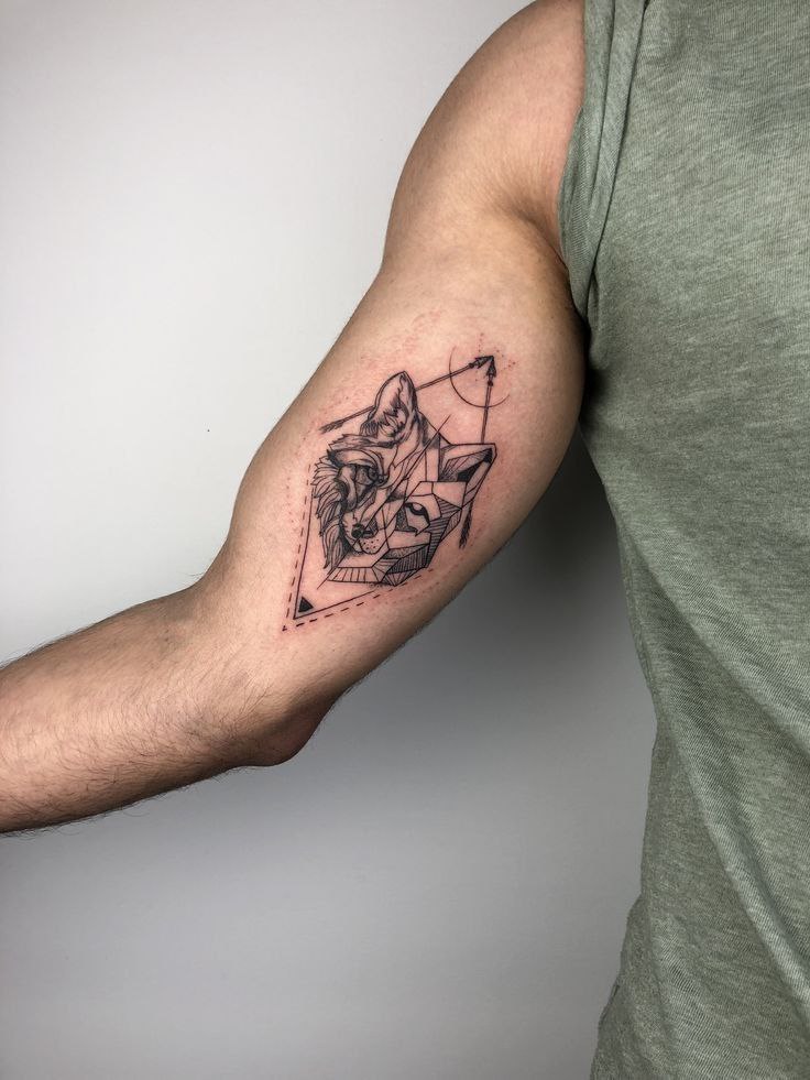 Tattoo of a fox on the biceps for men