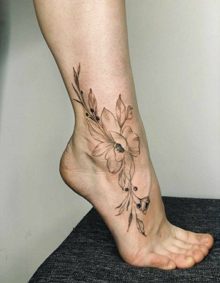 Large ankle flower tattoo for women