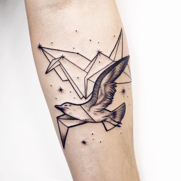 Large gull tattoo on the forearm for women