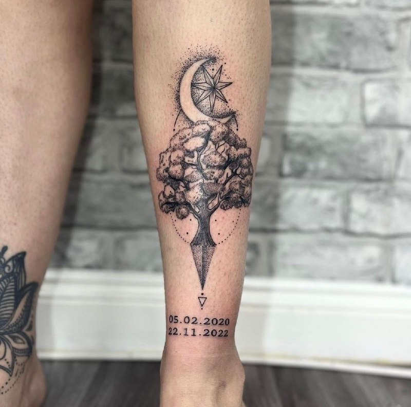 Tree and moon tattoo on the shin for women