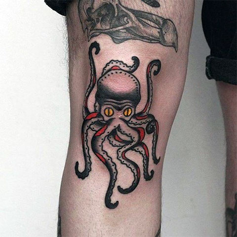 Colored octopus tattoo on the shin for men