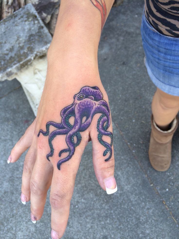 Colorful octopus tattoo on the brush for women