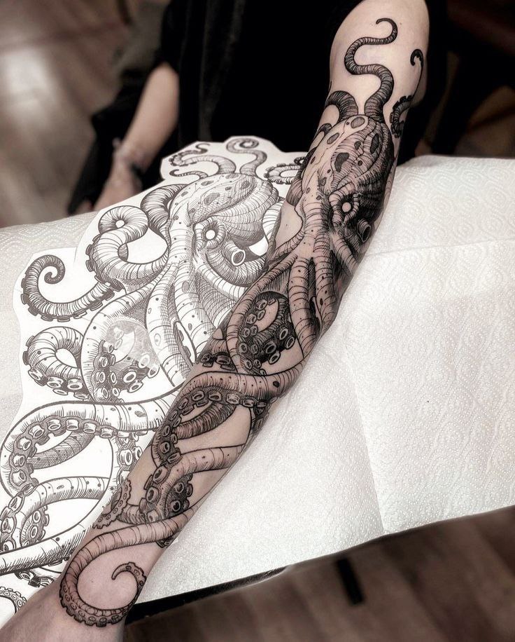 Large octopus tattoo on the arm for men