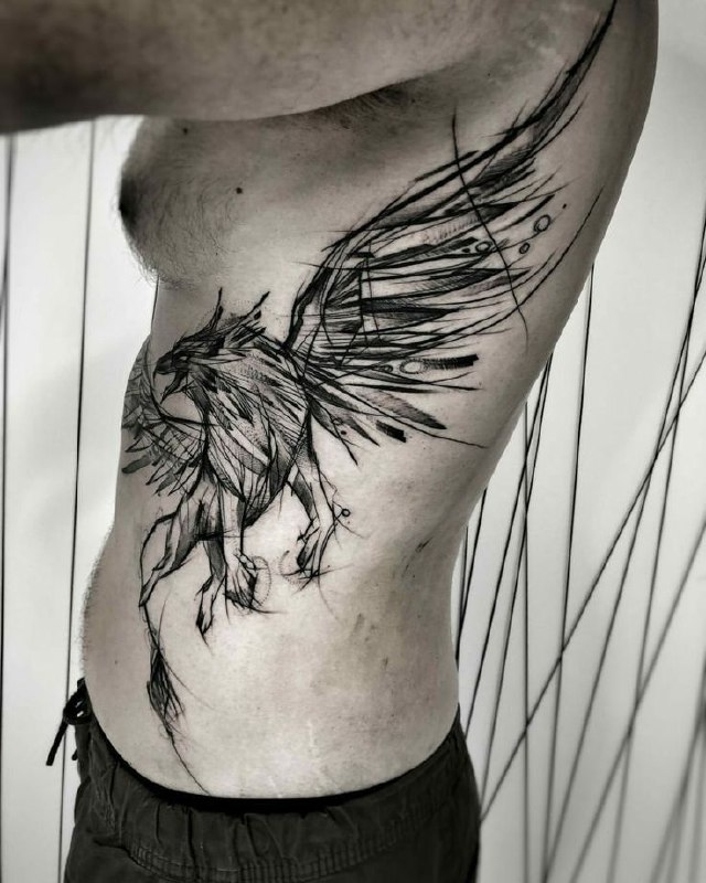 Large griffin tattoo on the side for men