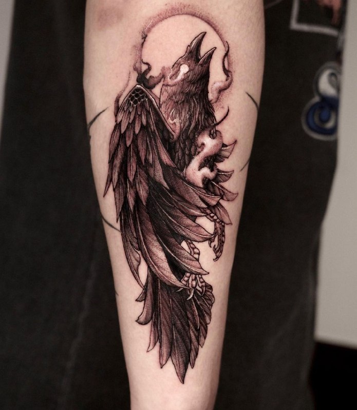 Tattoo of a raven on the forearm for men