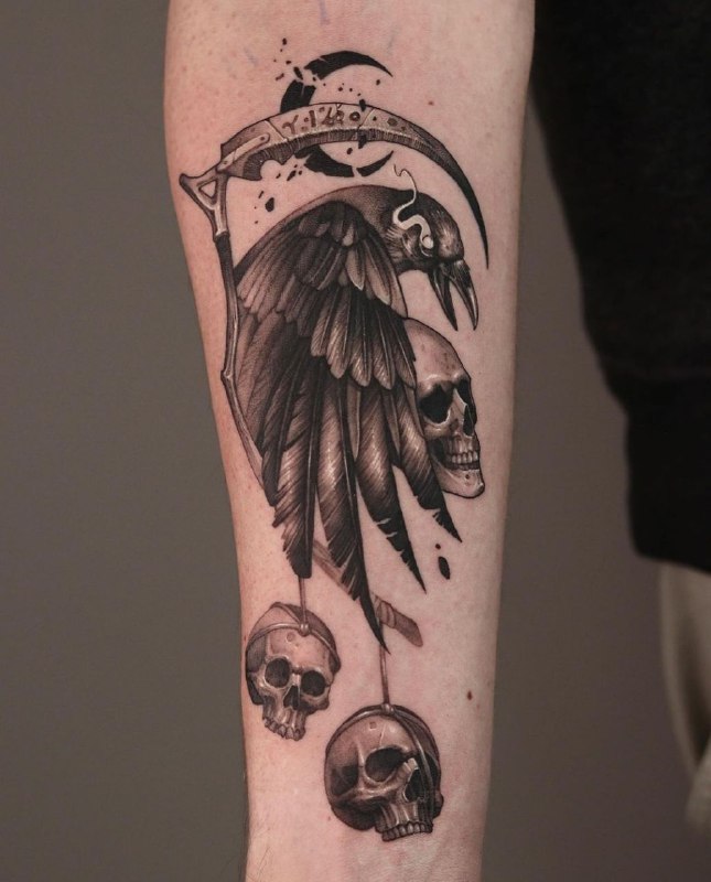 Tattoo of a raven with skulls on the forearm for men