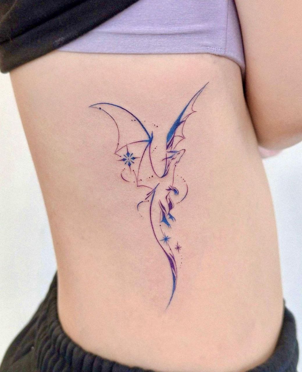 Color tattoo on the side for women