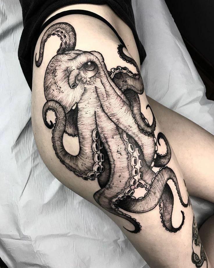 Large octopus tattoo on the thigh for women