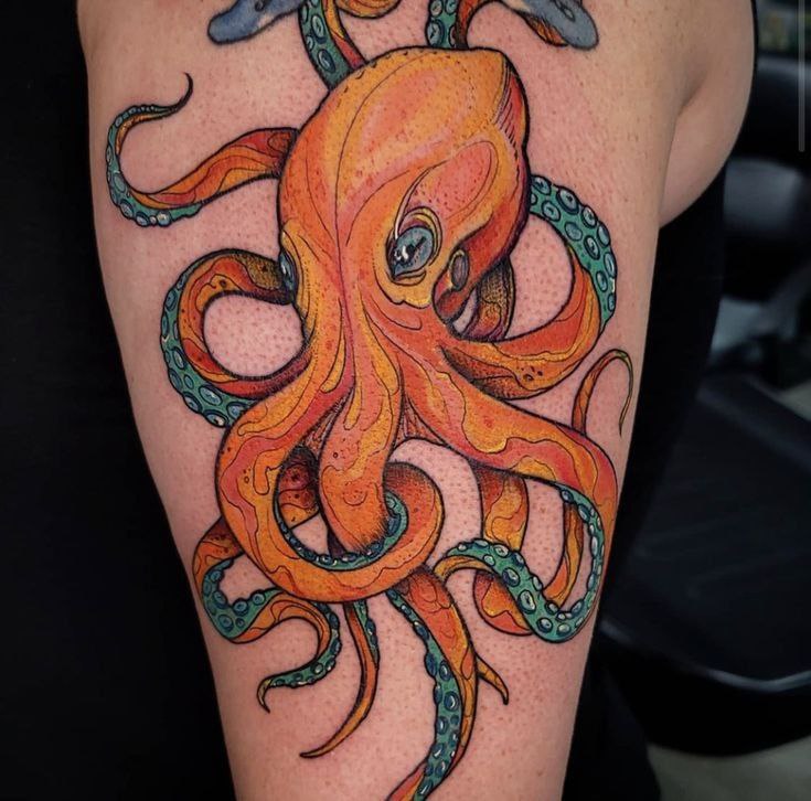 Colorful octopus tattoo on the shin for women