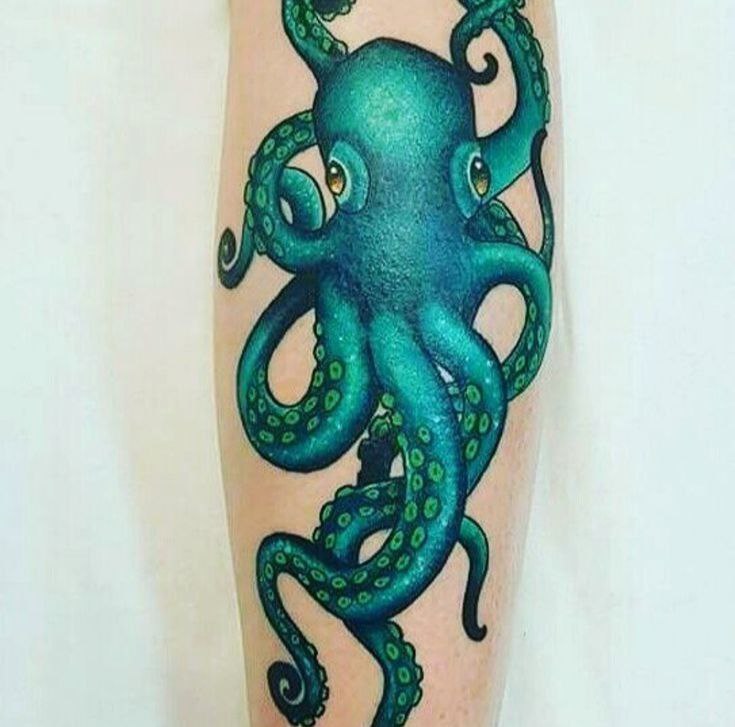 Colorful octopus tattoo on the forearm for women