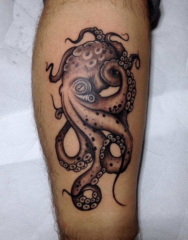 Large octopus tattoo on the shin for men