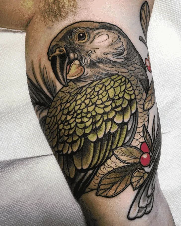 Color parrot tattoo on the shoulder for men