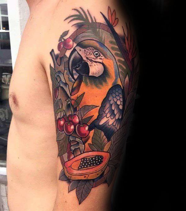 Large parrot tattoo with cherries on the shoulder for men