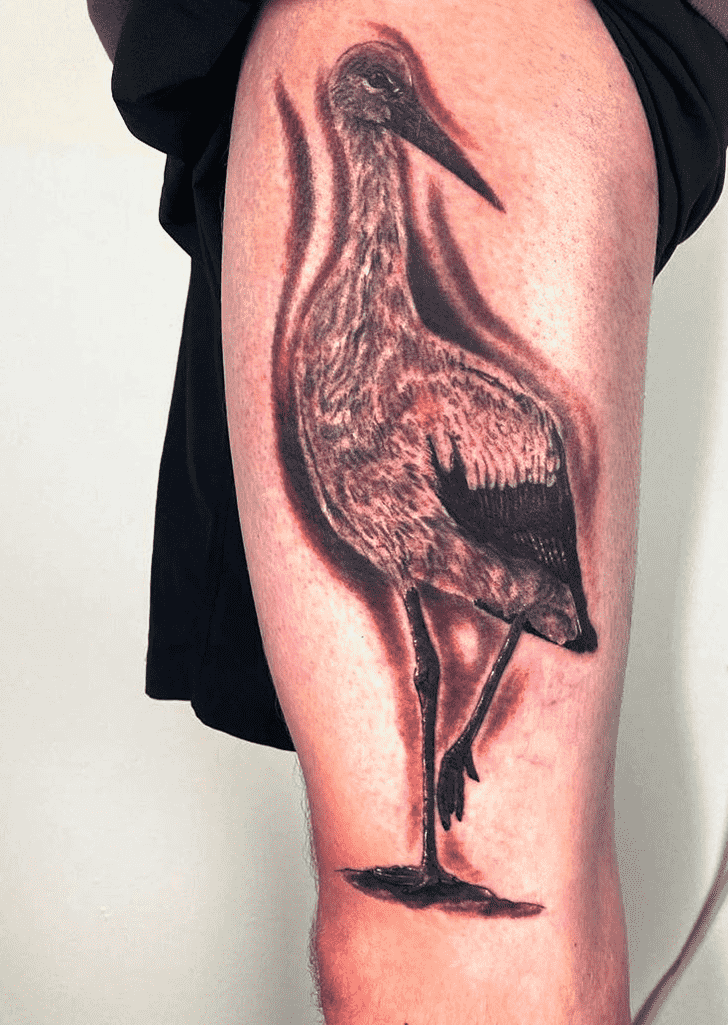 Large stork tattoo on the thigh for men