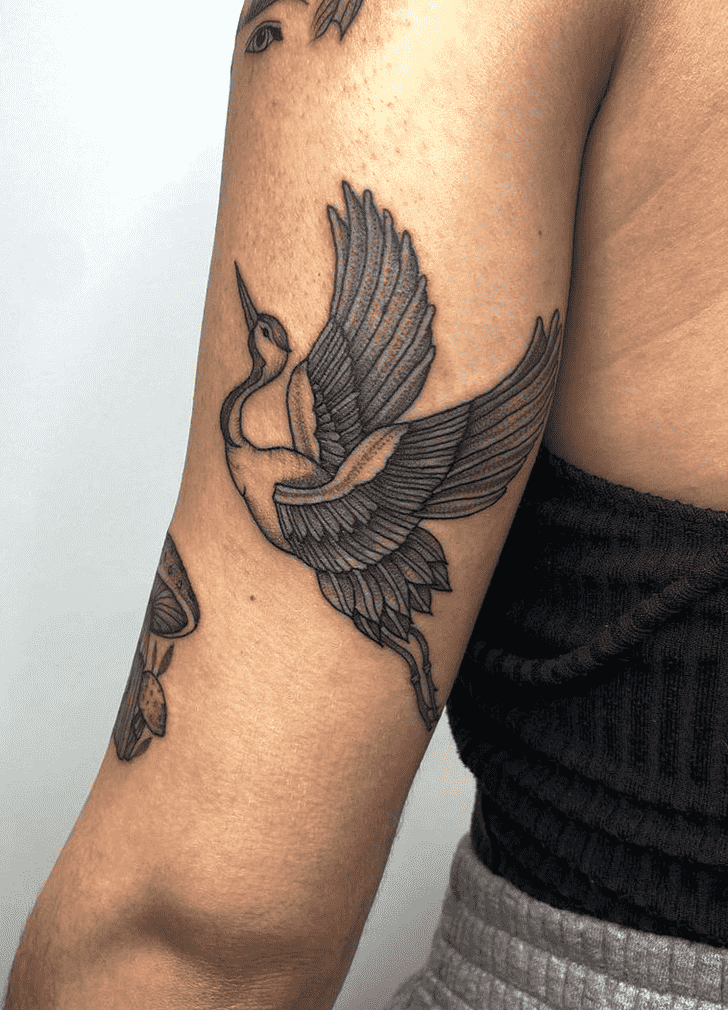 Stork tattoo on the shoulder for women