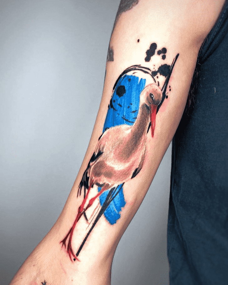 Colored stork tattoo on the forearm for men