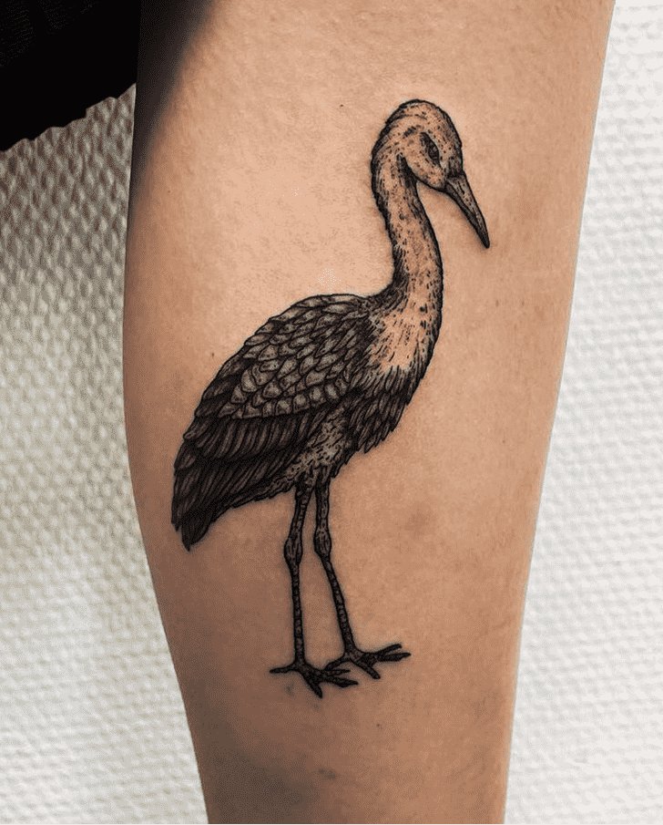 Stork tattoo on the shoulder for women