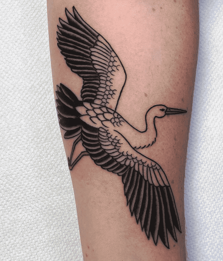 Stork tattoo on the arm for women