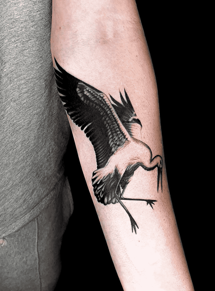 Stork tattoo on the forearm for women