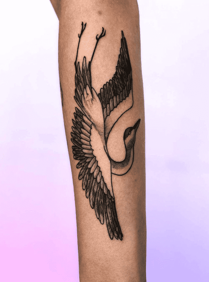 Large stork tattoo on the forearm for women