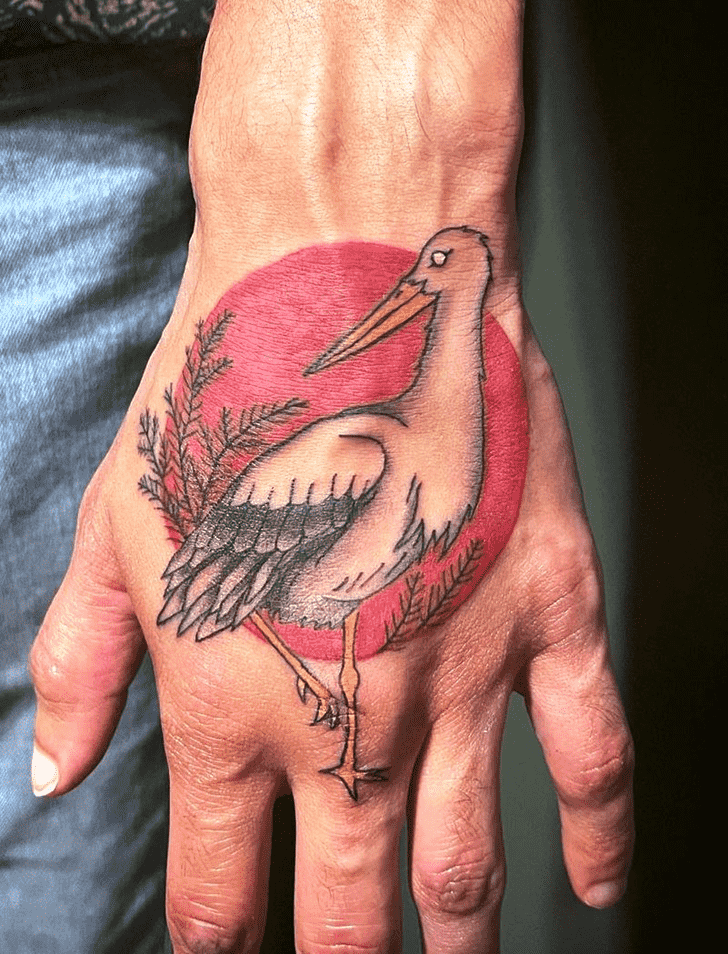 Colorful stork tattoo on the hand for men