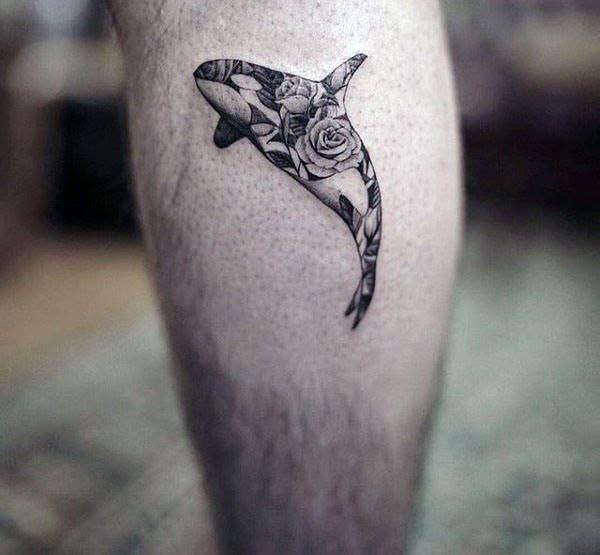 Orca tattoo on the shin for men