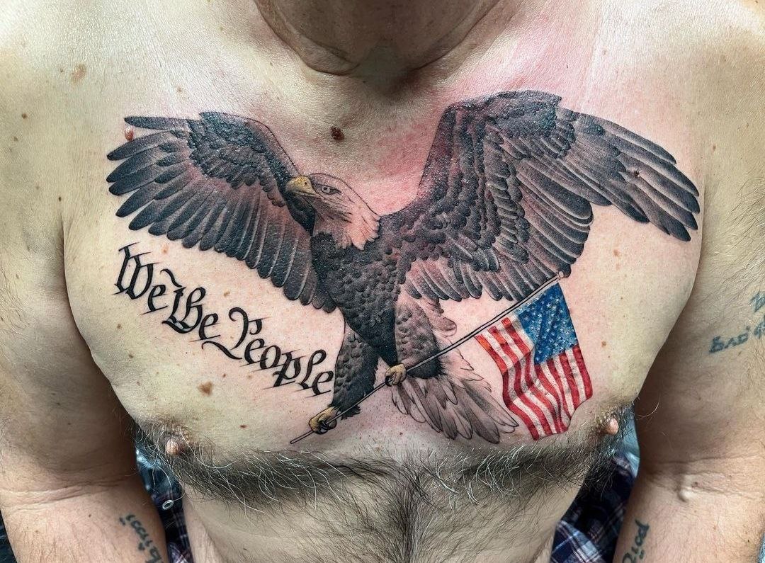 Large eagle tattoo on the chest for men