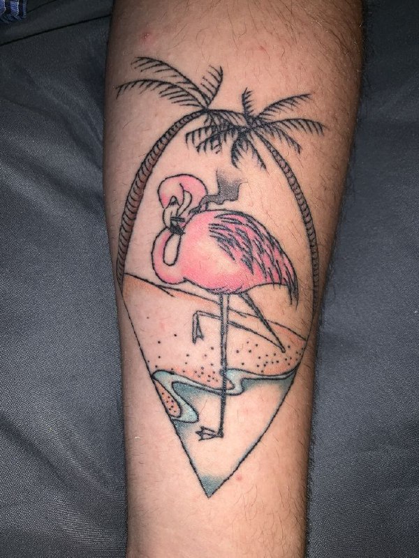 Color flamingo tattoo with palm trees on the forearm for men